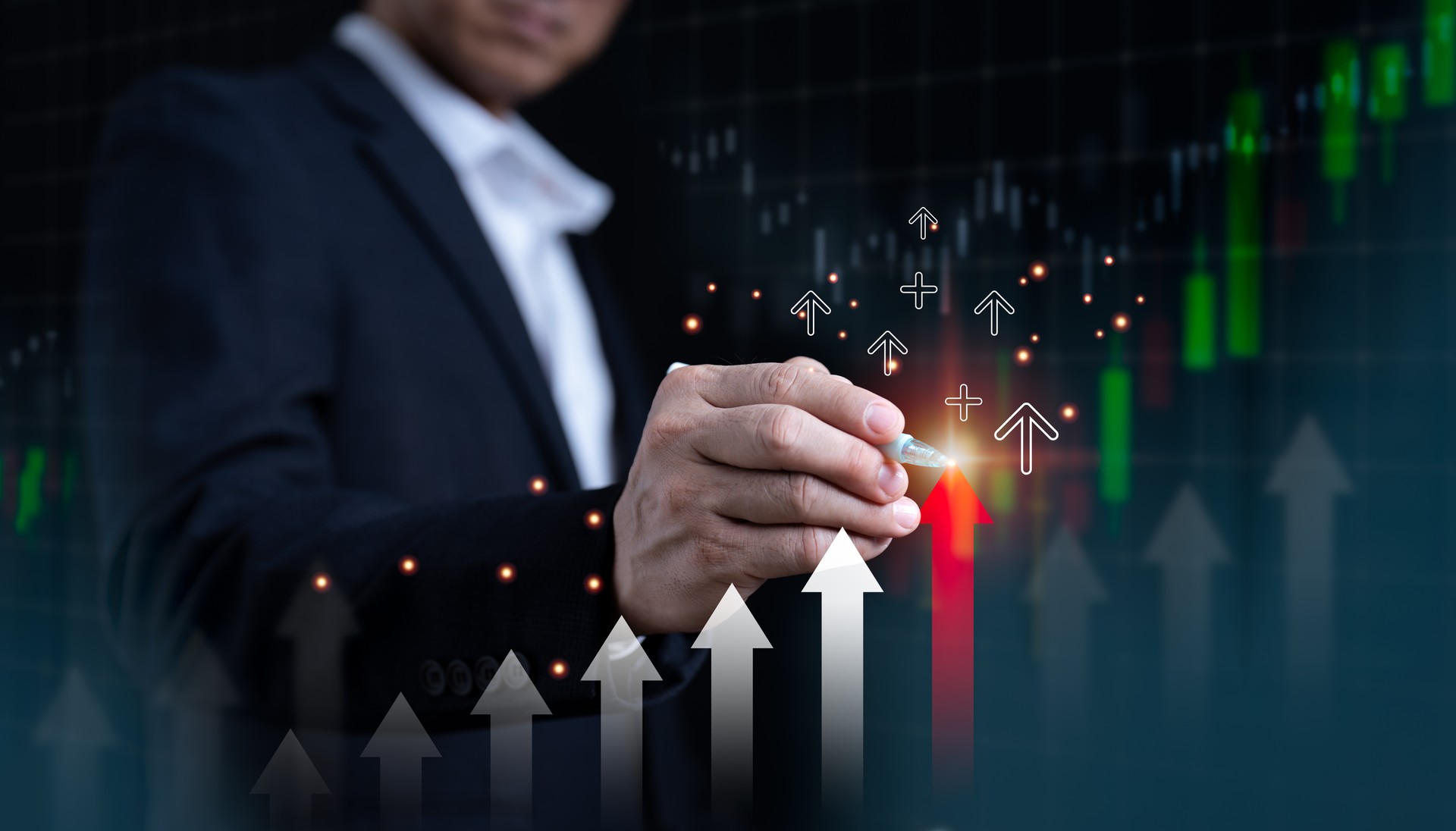 A businessman gestures to an arrow graph that shows the percentage increase and future growth strategy of the company. Building a business from the ground up is the idea behind expanding, succeeding.